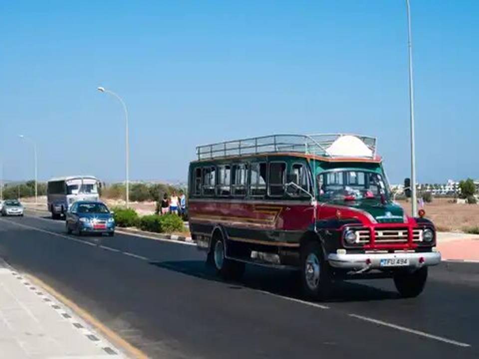 A red Cyprus Bus